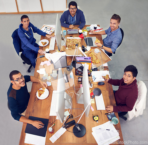 Image of Business team, men and portrait while eating with top view for deadline, pizza and coworking company. Programmer, collaboration and working on lunch with fast food, happiness and software development