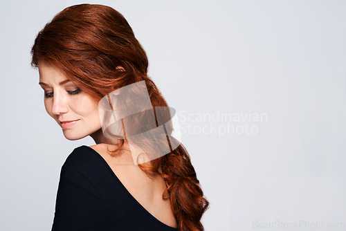 Image of Beauty, hair and space with woman in studio isolated on white background for natural wellness. Cosmetics, haircare and salon with confident mature model on mockup for keratin treatment at spa