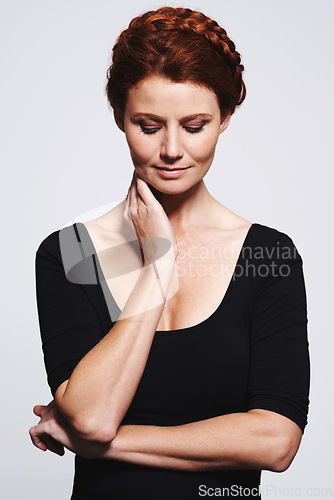 Image of Haircare, braid and cosmetic treatment for female person, spa and salon on studio background. Beauty, plait and healthy hair for Scottish woman model, hand and keratin for redhead or ginger lady