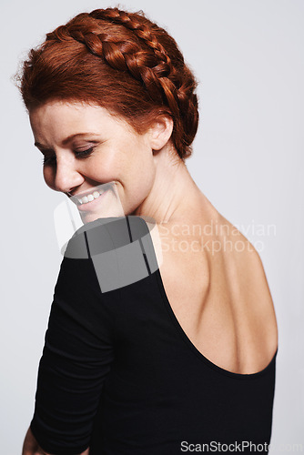 Image of Smile, beauty and haircare with plait for woman person, studio and isolated on white background. Ginger, braid and redhead female model, over shoulder or cosmetic treatment for healthy hair aesthetic