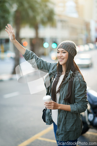 Image of Woman, fashion and ride with call, urban and city street or background for style. Asian student, beanie and jacket in cape town with winter, cold and travel with adventure or holiday for confidence