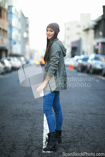 Image of Women, travel and portrait in street in city for tour on urban culture or cityscape, vacation and journey in town. Female person, smile and walk with coffee, explore and holiday or trip in New York.