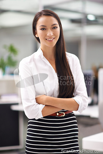 Image of Portrait, happy or young businesswoman in office or professional person with arms crossed in job confidence. Positive, face or journalist for career satisfaction, pride or talent as writer in company