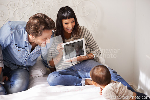 Image of Family, child and toddler for video call in bedroom, internet and happy for grandparents on screen. Parents, baby and security in connection or laugh, communication and love or online for bonding