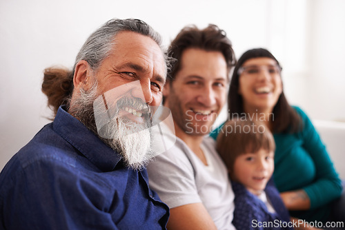 Image of Family, portrait and parents, grandfather and child in living room, happy together with generations and love. Bonding, care and people relax at home with smile on face, trust and support in life