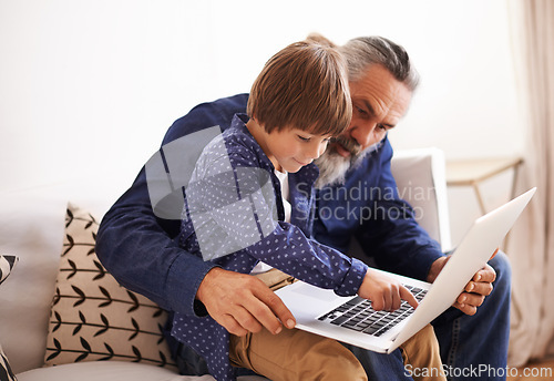 Image of Grandfather, son and laptop in lounge with love and bonding together with cartoon in living room. Happy family, boy and computer for choice of online games, holiday and movie subscription in home