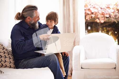 Image of Grandfather, child or laptop on couch to relax, love or bonding together for cartoon in living room. Happy family, boy or computer for fun on internet games or streaming a movie subscription in home