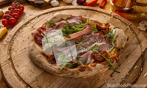 Image of Artisan pizza with sun dried tomatoes