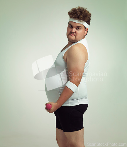 Image of Plus size, portrait and man with dumbbells for workout, sport or exercise in studio isolated on white background mockup space. Body health, fitness and person weightlifting for weight loss or muscle