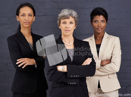 Image of Team, diversity and portrait of business women with confidence, power and empwerment in corporate career by gray wall. People, management and leadership together for job in banking, finance and trade