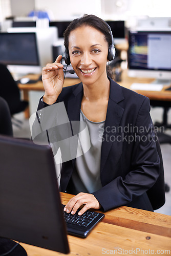 Image of Call center, portrait and woman in office consulting for lead generation, contact us or faq. Telemarketing, face and happy female consultant with microphone for customer support, help or b2b service