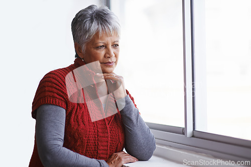 Image of Window, senior woman and thinking with ideas, home and retirement with decision and problem solving. Old person, elderly lady and pensioner with view and thoughts with wonder and solution with peace