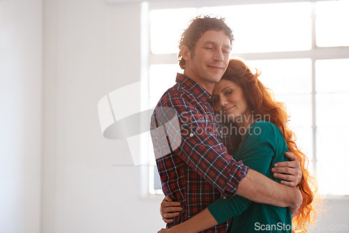 Image of Couple, hugging and affectionate with love, affection in home together with female person and husband. Trust, care and romantic in relationship with happy married people, compassion and bonding