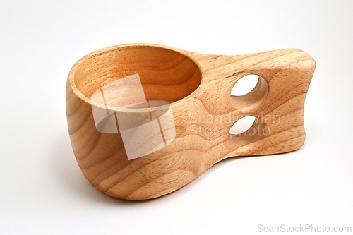 Image of traditional finnish wooden kuksa cup on white background