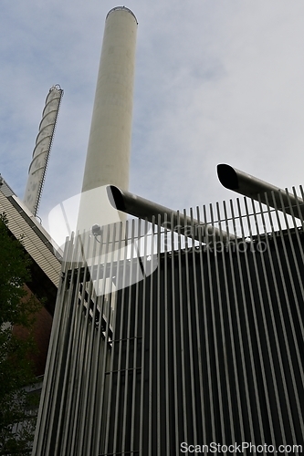 Image of industrial building and two pipes
