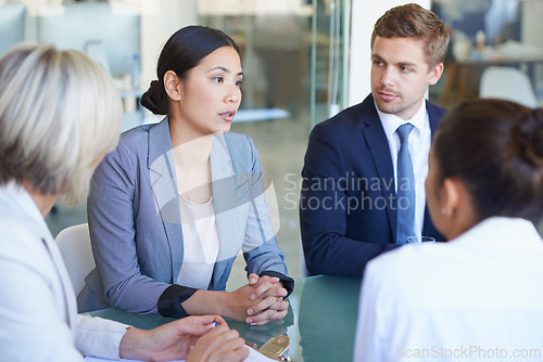 Image of Business meeting, conversation and corporate consulting with discussion for project and teamwork. Staff, working and company with planning and professional talk at a desk in a consultant office