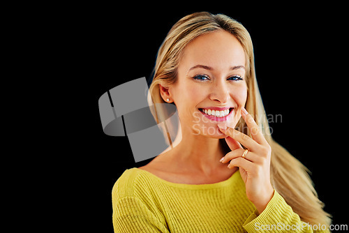 Image of Dark background, portrait and woman with idea, thinking and plan for story of fantasy for author in studio. Adult, girl and female person daydreaming of inspiration in mind, contemplating and happy