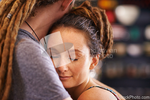 Image of Hug, rasta and home with couple, marriage and bonding together with happiness and relaxing. Peaceful, apartment and embrace with romance and dreadlocks with relationship and love with man and woman