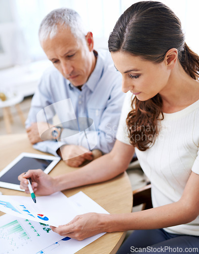 Image of Meeting, man and woman with paperwork for data analysis, sales review or development with tablet. Planning, strategy and business people with stats, charts and graphs for increase on profit report