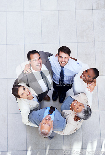 Image of Business people, portrait and huddle for team circle in office, community and support or unity. Colleagues, diversity and collaboration in embrace in workplace, solidarity and above for cooperation