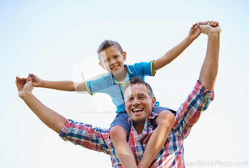 Image of Dad, young boy and shoulders of parent, sky and outdoors in park with smile. Laugh, love and bonding with son and father with family, spring and carrying child in summer and spending time together