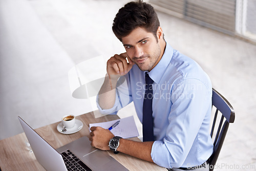 Image of Smile, laptop and notepad for businessman, notes and online work in cafe with coffee. Thinking, internet and technology for email for professional male person, pen and reports for remote working