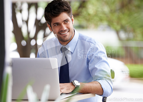 Image of Laptop, thinking and remote working businessman, smile and outside cafe for online work. Pensive, internet and technology for email for professional male person, notes and reports or paperwork