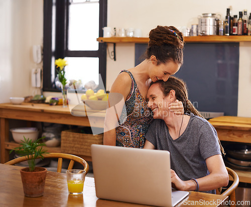 Image of Home, couple and typing with laptop, hug or email with online reading, breakfast or research. Planning, apartment or dreadlocks with man or woman with computer or internet with tech, smile or embrace