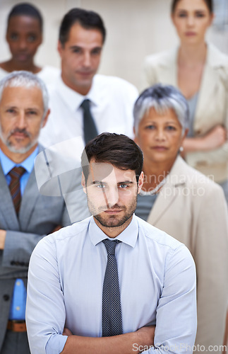 Image of Portrait, leadership and group of business people with solidarity, confidence or serious at startup. Community, professional men and women together in office with teamwork, pride and trust in manager