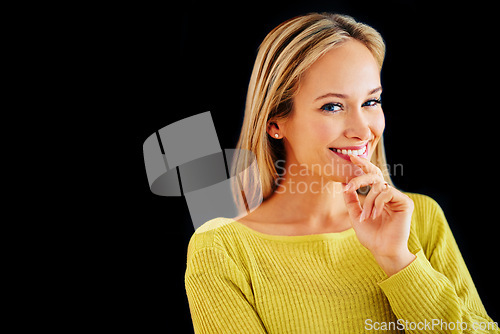 Image of Studio, memory and portrait of woman, thinking and plan for story of fantasy for author in black background. Adult, girl and female person daydreaming of inspiration in mind, contemplating and happy