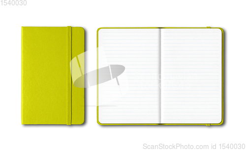 Image of Lime green closed and open lined notebooks isolated on white