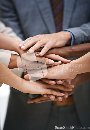 Image of Hand, teamwork and business people in support with solidarity, collaboration and partnership trust closeup. Team building, community and employees zoom with diversity, commitment and goal motivation