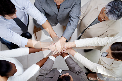 Image of Group, top view or business people with hands in stack for mission goal, collaboration or teamwork. Team building, unity circle or above of employees in meeting with support, solidarity or motivation