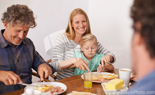 Image of Parents, child and home for breakfast on happiness in morning for bonding with conversation, support and care. Family, kid and guest for meal to eat with coffee in table for fun, enjoy and together.