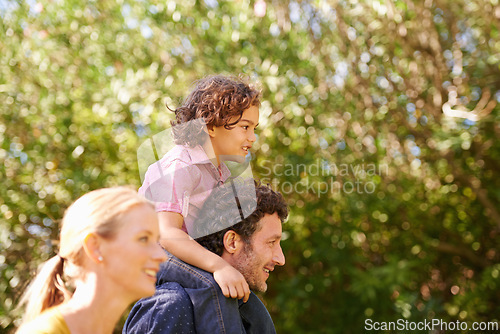 Image of Piggyback, parents and child in nature on shoulder, happy care and bonding with kid smile in park. People, outside walking and family together in summer, love and growth for children development