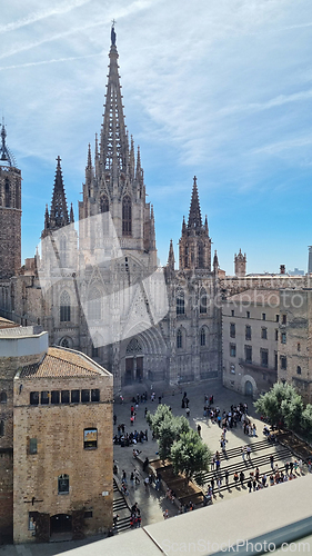 Image of BARCELONA, SPAIN - APRILL 4, 2024: Grand cathedral towering over city