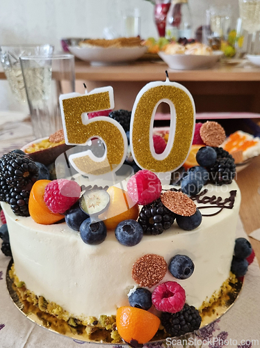 Image of A 50th birthday cake with fruit
