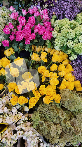 Image of A bunch of flowers on a table