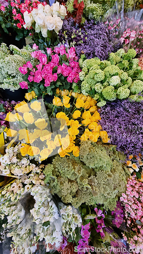 Image of A bunch of flowers on a table