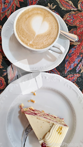 Image of Cake and coffee on a plate