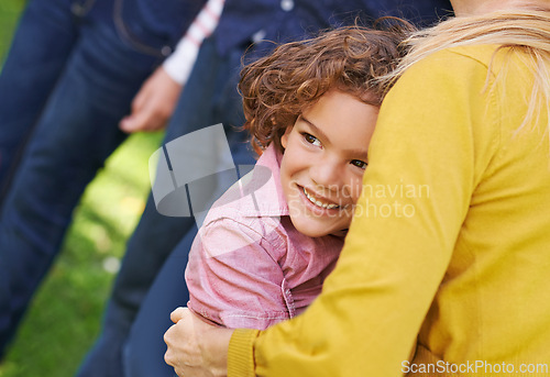 Image of Kid, woman or hug as thinking of family, support or safety as vision of trust, bonding or together. Boy, mother or idea of happy, outing or memory of care as protection in park on summer afternoon