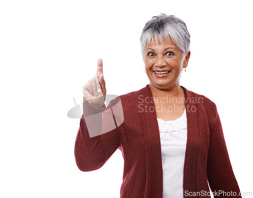 Image of Portrait, smile and pointing up with senior woman, choice and model isolated on a white studio background. Face, pensioner and mature lady with hand gesture and options with opportunity and promotion