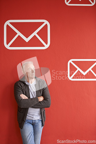 Image of Email icon, thinking and senior man with arms crossed, ideas and employee on red studio background. Mature person, model or entrepreneur with planning and symbol for communication, choice or envelope