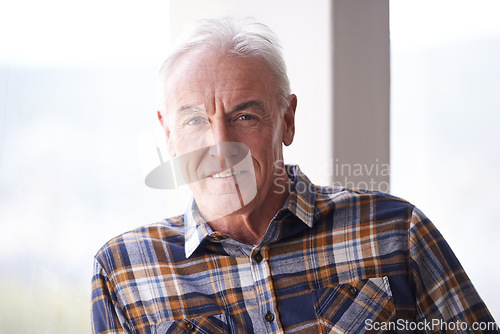 Image of Portrait, retirement and senior man in home to relax in apartment alone by window in Australia. Face, elderly and male person with confidence or handsome pensioner in casual clothes at nursing house