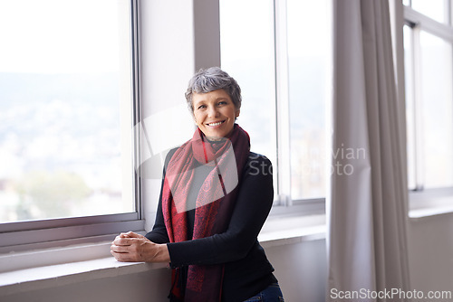 Image of Portrait, smile and senior woman in home to relax in apartment by window in Australia. Face, elderly and happy person with confidence or pensioner in casual clothes at nursing house for retirement