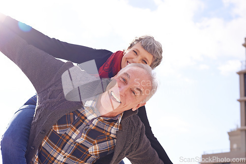 Image of Portrait, happy couple and piggyback or love in vacation, retirement holiday and celebrate with smile. Outdoor, elderly people and marriage or commitment for bonding, care and romance in relationship