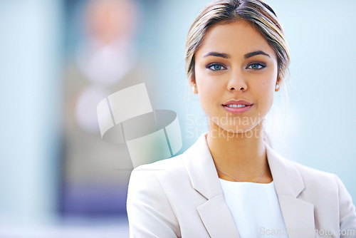 Image of Business woman, pride and smile in portrait, paralegal at law firm and confidence with ambition in workplace. Young professional, career and legal expert at office with mockup space and corporate job