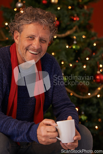 Image of Happy man, portrait and Christmas tree with coffee, mug or cup of tea for festive season or celebration at home. Face of senior or male person with smile for hot beverage, December holiday or weekend