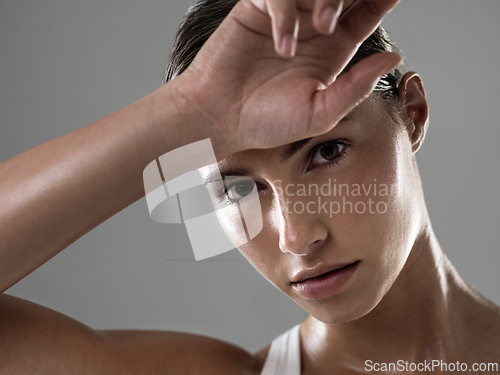 Image of Woman, hand and portrait for workout sweat in studio for physical activity, performance or grey background. Female person, face and exercise training for sports athlete or healthy, fitness or mockup