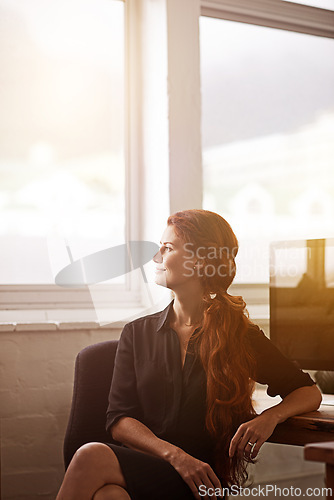 Image of Woman, work and think with smile at window for company idea, vision and growth with future in startup business, company growth. Female person, entrepreneur and desk with computer in office as hr.